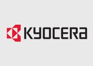 Kyocera-Logo mit einem roten geometrischen Symbol auf der linken Seite und dem Wort KYOCERA in fetten, schwarzen, stilisierten Großbuchstaben auf hellgrauem Hintergrund, das für Innovation bei ERP-Lösungen steht.