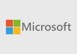Das Microsoft-Logo mit den vier farbigen Quadraten (rot, grün, blau und gelb), die ein Fenster bilden, neben dem Wort Microsoft in grauer Schrift auf hellem Hintergrund - perfekt für ERP-Lösungen.