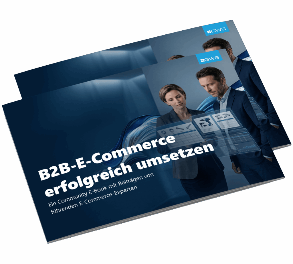 Zwei Fachleute betrachten virtuelle E-Commerce-Grafiken auf einem blauen Broschürenumschlag mit dem Titel B2B-E-Commerce erfolgreich umsetzen und einem zusätzlichen Text mit Beiträgen von führenden E-Commerce-Experten.